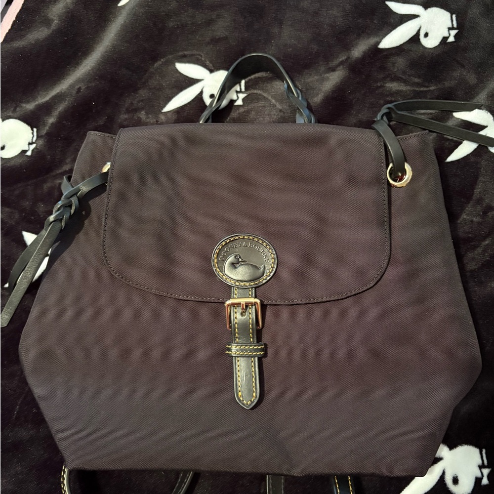 Dooney & Bourke Black Backpack with Elegant Metal Accent
